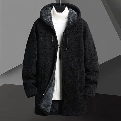 Black hooded coat with gray lining on a gray background