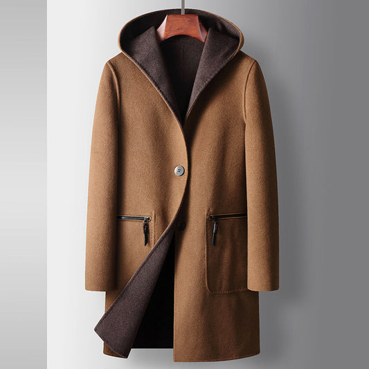 Brown coat with a hood on a gray background