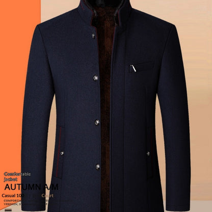 Navy blue coat on a mannequin against an orange and beige background