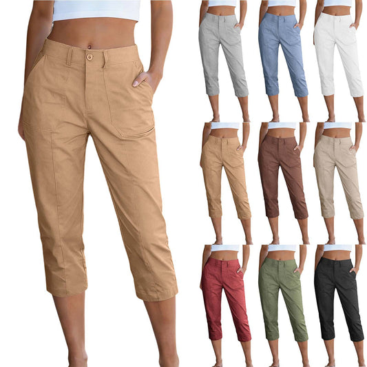 Collection of capri pants in various colors on a white background